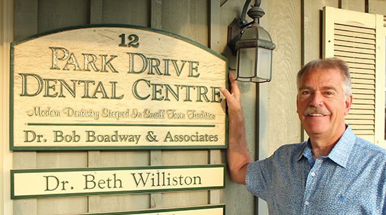 Dr. Bob with Park Drive Dental Sign